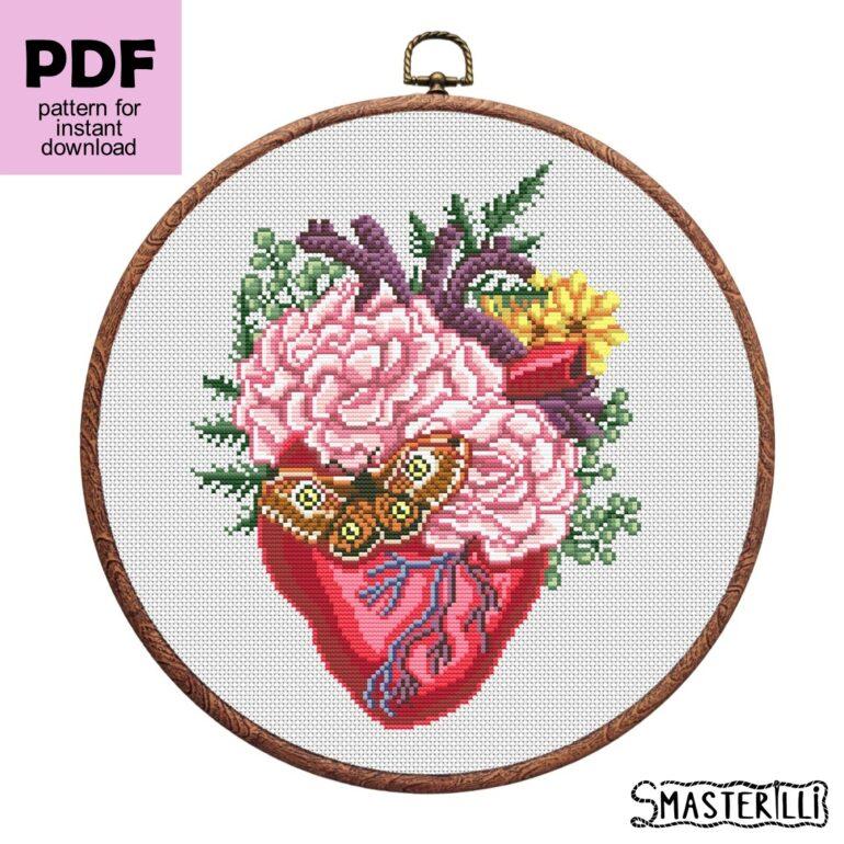 Anatomical heart with flowers cross stitch pattern with flowers and plants. Embroidery ornament by Smasterilli. Digital cross stitch pattern for instant download. #smasterilli #crossstitch #crossstitchpattern #lovecrossstitch #valentinedaygift #heartcrossstitch #anatomicalheart