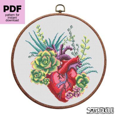 Anatomical heart cross stitch pattern with flowers and plants. Embroidery ornament by Smasterilli. Digital cross stitch pattern for instant download. #smasterilli #crossstitch #crossstitchpattern #lovecrossstitch #valentinedaygift #heartcrossstitch #anatomicalheart