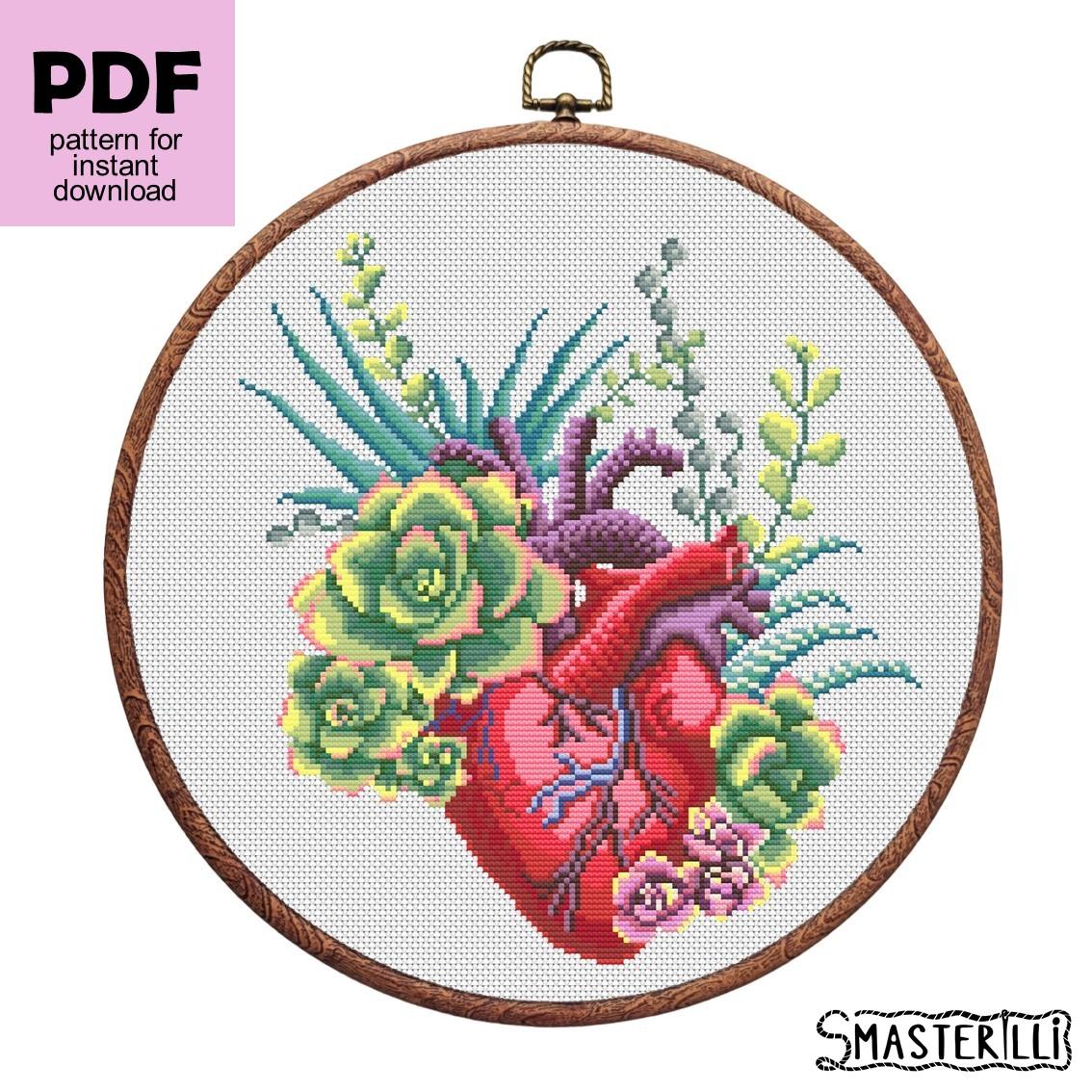 Anatomical heart cross stitch pattern with flowers and plants. Embroidery ornament by Smasterilli. Digital cross stitch pattern for instant download.